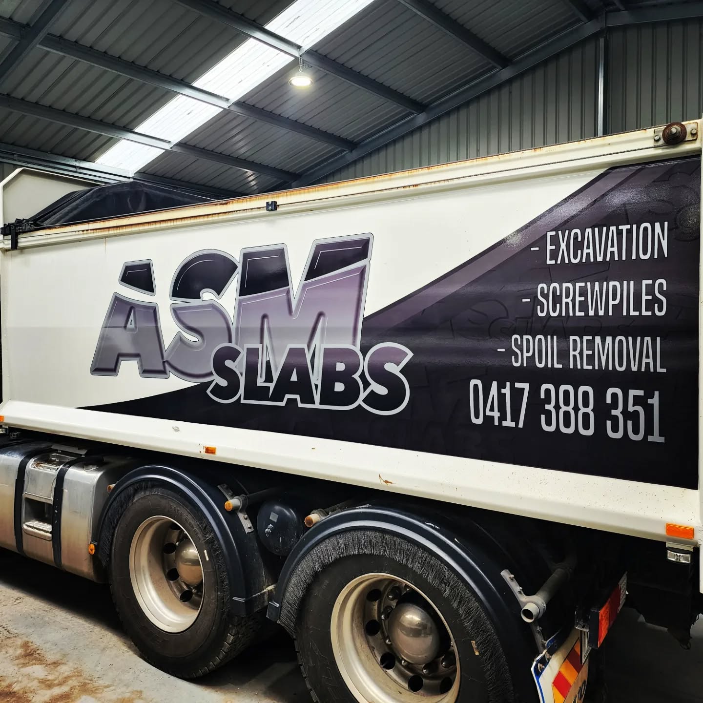 ASM Slabs rebranding 2 of their trucks!
